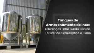Banner promocional para o blog da Inox Biaso dividido em diagonal. À esquerda, aparecem dois grandes tanques verticais de armazenamento em aço inox polido com fundo cônico, montados sobre suportes de metal em uma área industrial. À direita, sobre um fundo cinza-escuro com a marca d'água do logotipo, lê-se o título em letras brancas: "Tanques de Armazenamento de Inox: Diferenças Entre Fundo Cônico, Torisférico, Semi Elíptico e Plano".
